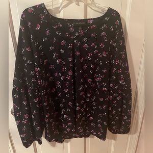 Long sleeve floral blouse.